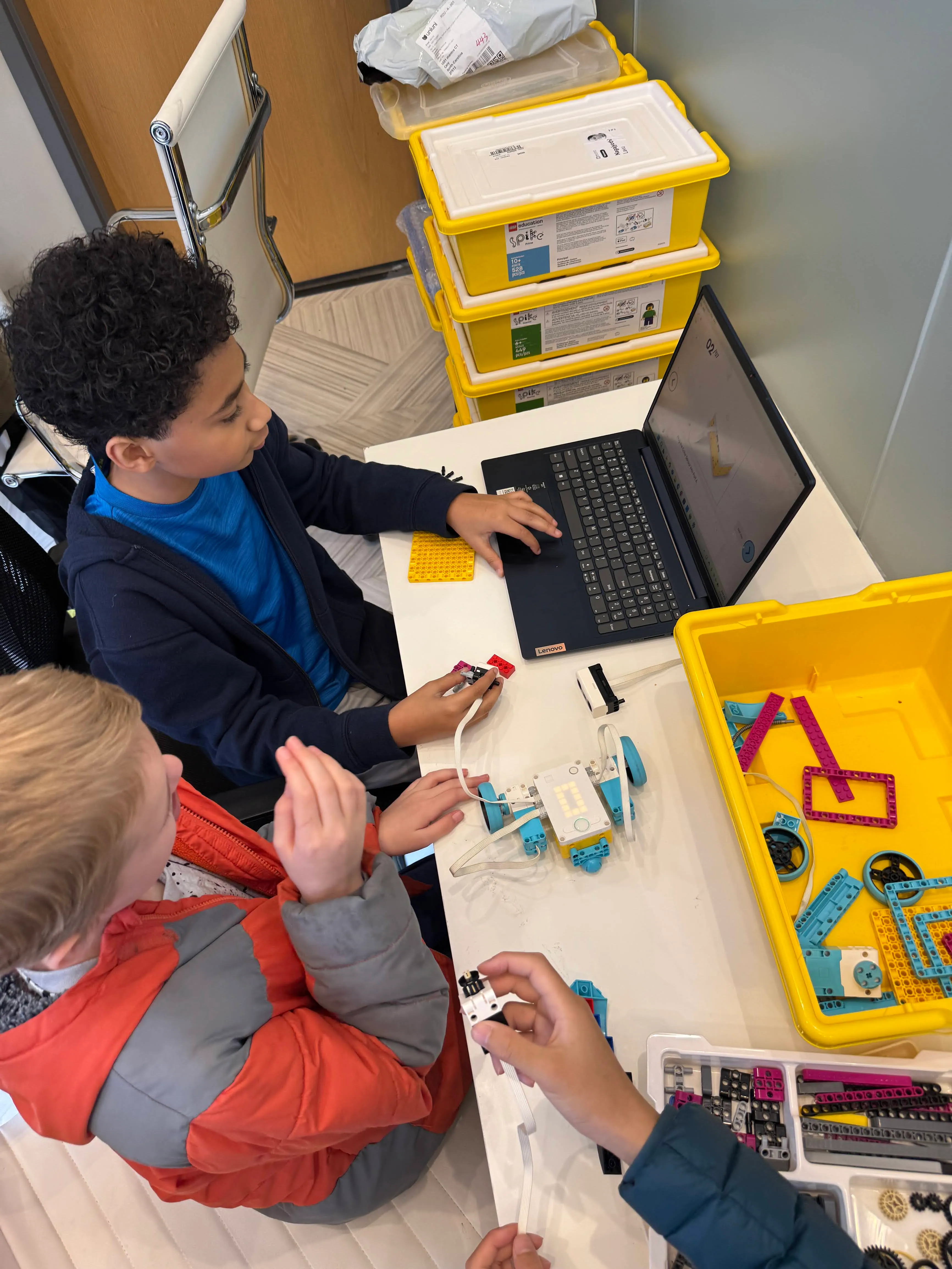 Learners coding Sphero mini robots in the Technology Lab